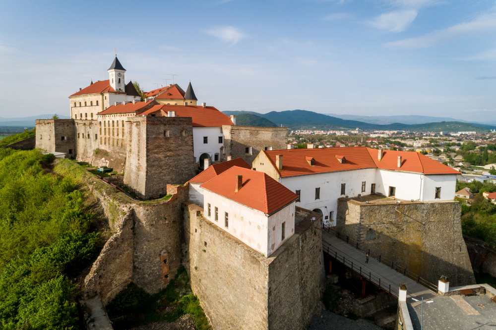 The Palanok Castle is a
              highlight of Ukrainian tourism. This 10th-century fortress is
              delicately preserved and divided into three buildings: the upper
              castle, middle castle, and lower castle. It also contains a
              historical museum and an art gallery. It was built on a 65-metre
              hill and offers astonishing panoramic views of Mukachevo city.